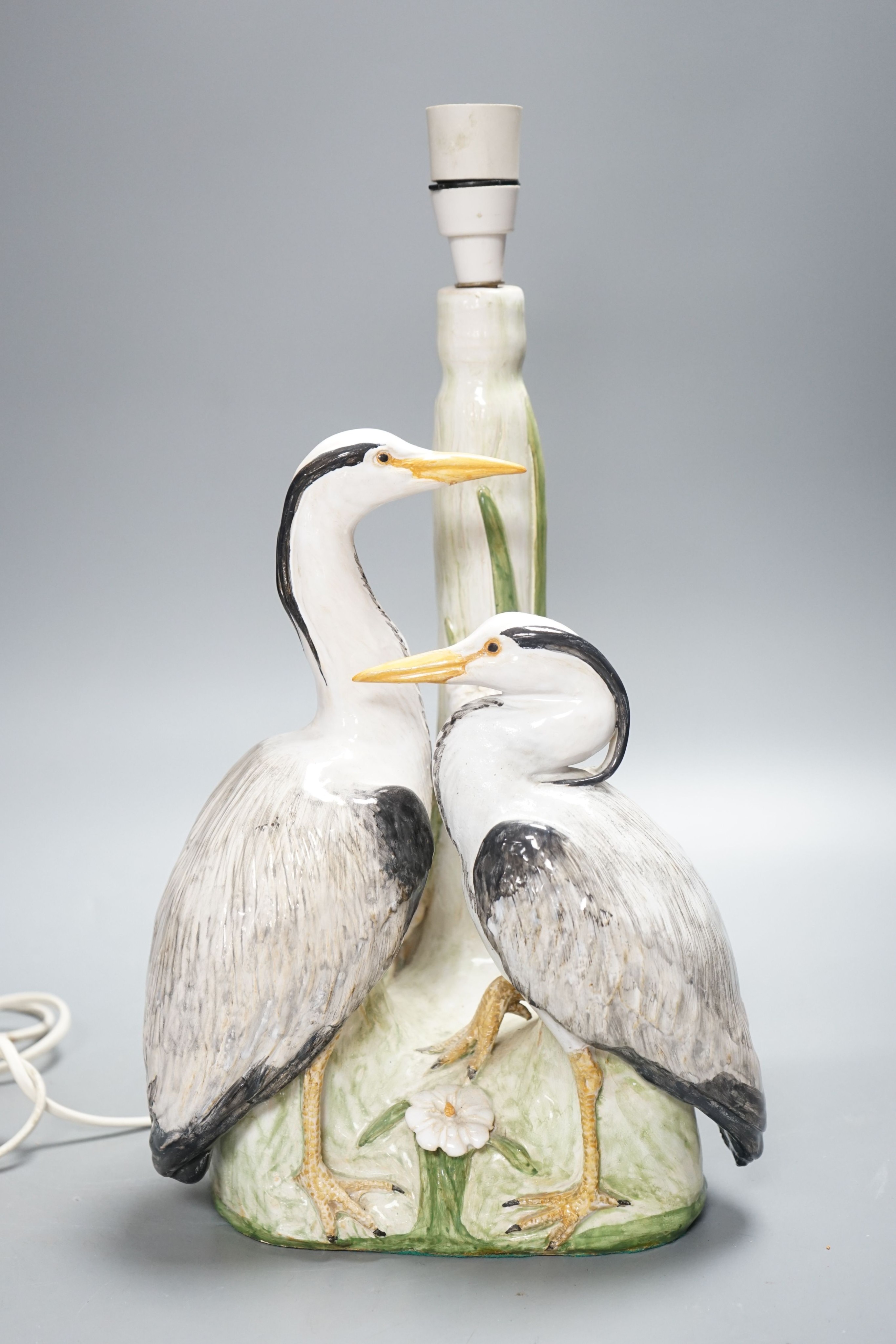 A tin glazed pottery twin heron table lamp, by Brenda Dennis 33cm